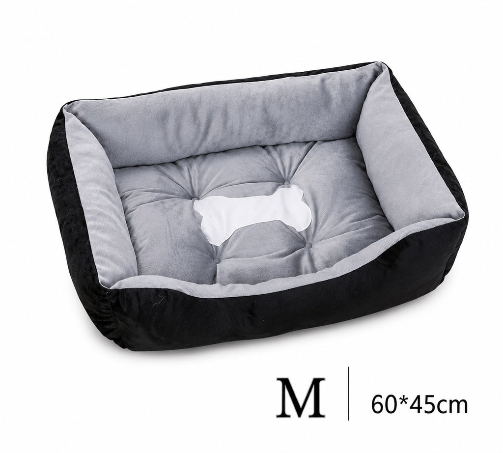 Orthopädisches Plüsch-Hundebett in Schwarz-Grau, Größe M (60x45 cm) – mit gesteppter Liegefläche und Knochen-Motiv | Hund & Heim
