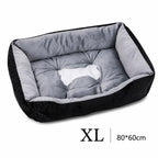 Orthopädisches Plüsch-Hundebett in Schwarz-Grau, Größe XL (80x60 cm) – mit gesteppter Liegefläche und Knochen-Motiv | Hund & Heim
