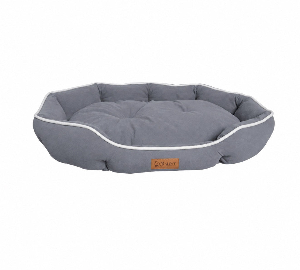 Orthopädisches Premium Hundebett in Graphitgrau mit extra weicher Polsterung, erhöhtem Rand und pflegeleichtem Bezug für kleine und große Hunde.